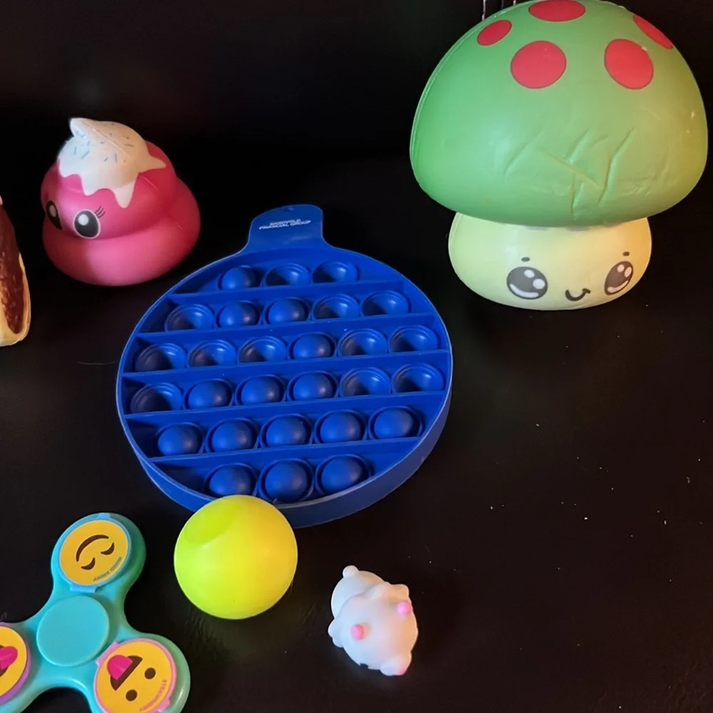 Bundle of squishies and Fidget and Animal Figures.